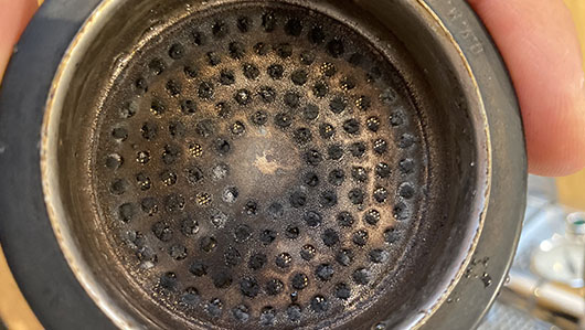 Verstopte douchzeef